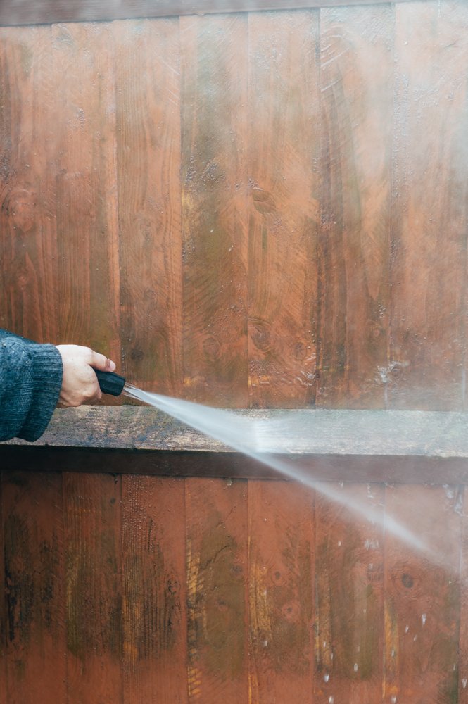 Professional power washing of a wooden fence in West Chester, OH